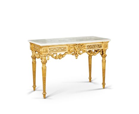 A North Italian Giltwood Side Table Italy circa 1780, having a pierced frieze carved with a stylised guilloche motif with hon