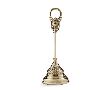 A Brass Doorstop England circa 1880, with a fox's head, the base decorated with hunting paraphernalia, the weight stamped W T