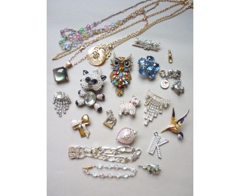 A quantity of vintage costume jewellery including a Butler and Wilson novelty westie brooch and one other owl brooch (a/f), t