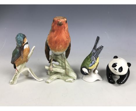 Three Goebel bird figures together with a Beswick panda