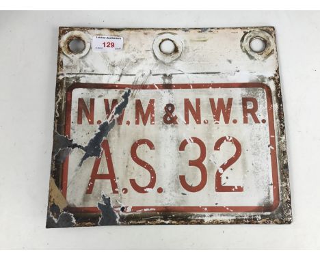 A 'N. W. M &amp; N. W. R / A.S. 32' enameled sign, 27 x 24 cm