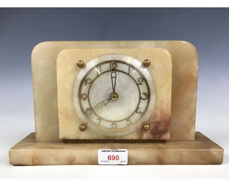 An onyx cased mantel clock