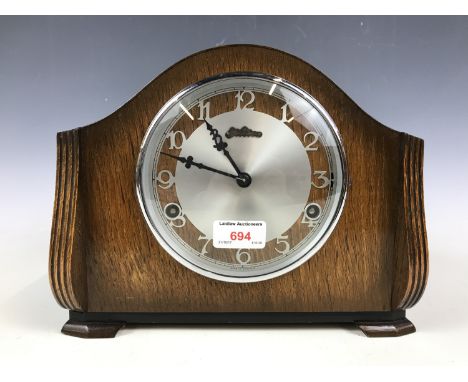 A mid 20th Century Bentima oak cased mantel clock