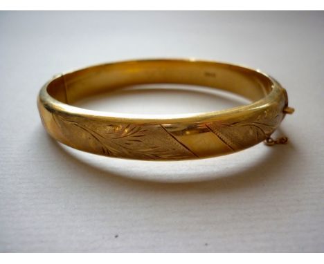 A vintage 9ct gold hinged bangle, 13.9 g