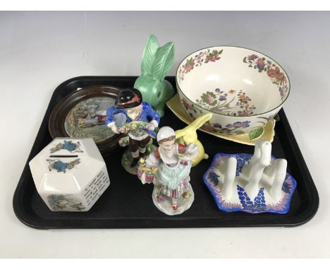 A framed pot lid together with a Peter Rabbit moneybox, a pair of Capo di Monte figures, a Wedgwood Etruria bowl and two Carl