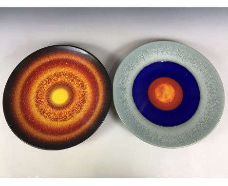 Two large Poole pottery chargers