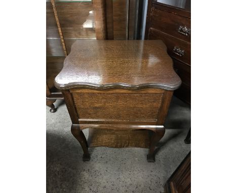 A mahogany turn over top card table 