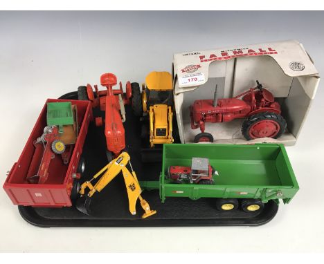 A super AV tractor together with a JCB and two trailers etc