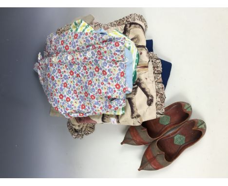 A quantity of vintage costume and textiles including a young girl's homemade Irish dancing costume, a printed cotton housecoa