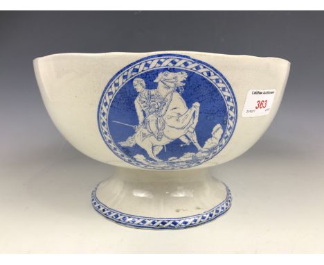 A Victorian blue-and-white transfer-printed earthenware footed bowl, decorated with vignettes of an 18th Century army officer