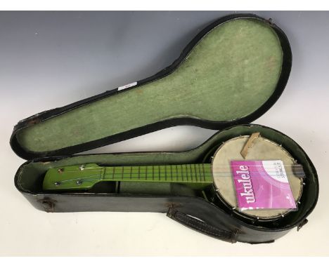 A vintage ukulele with case 