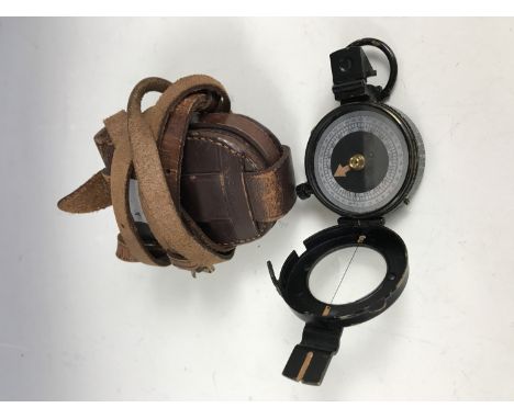 An E R Watts and Son of London compass in leather case