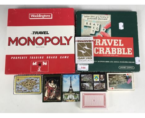 A quantity of vintage board and card games including Travel Scrabble and Travel Monopoly