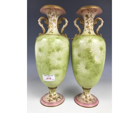 A pair of Carlton ware vases (one a/f)