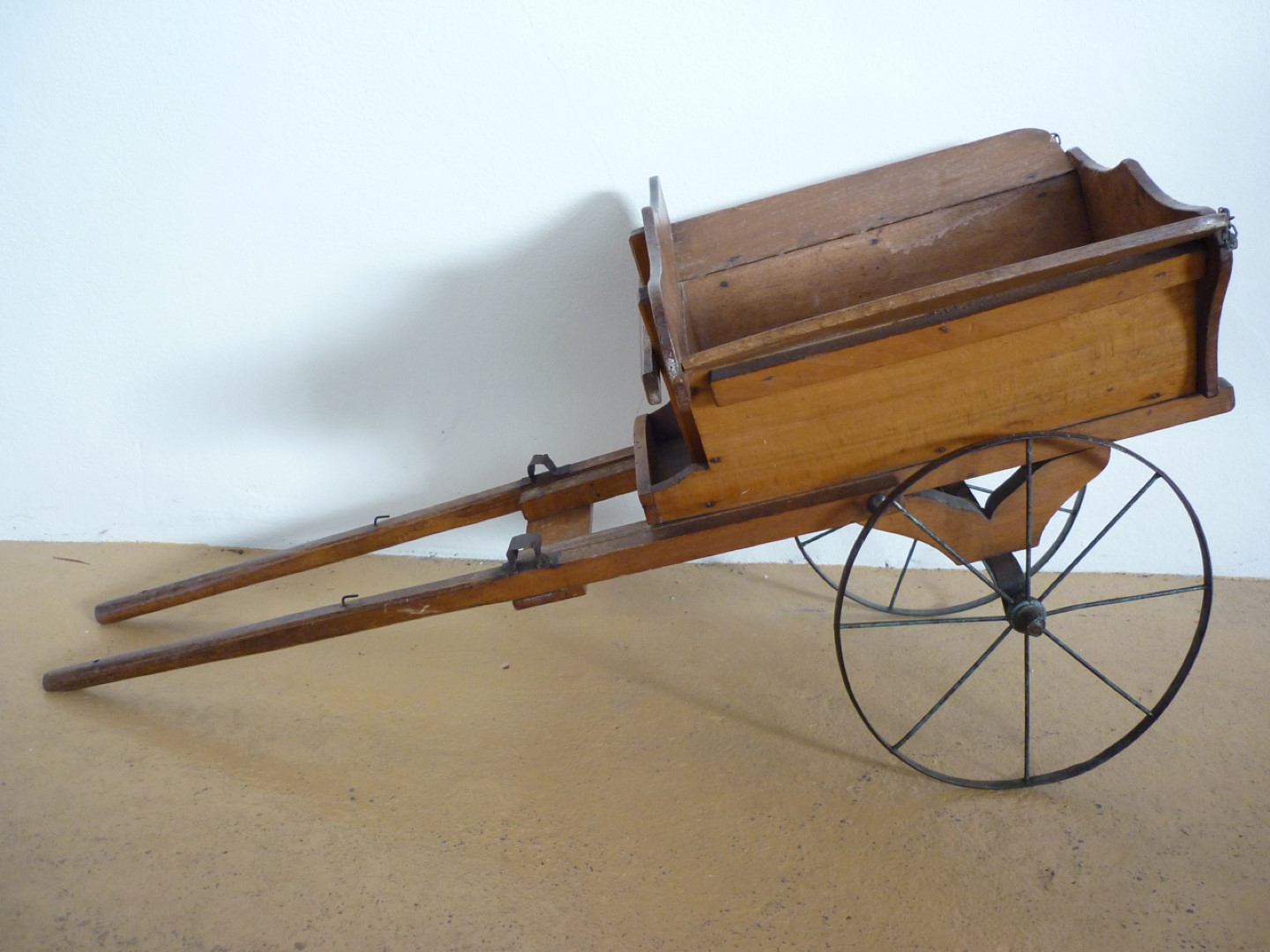 A Victorian wooden dog cart or tradesman's model tip cart, of