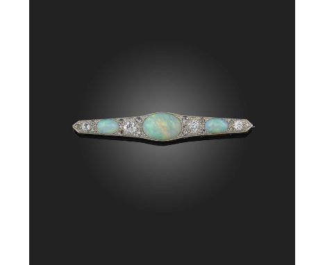 An opal and diamond brooch, early 20th century, of bar design, set with three cabochon opals, spaced with circular-cut and ro