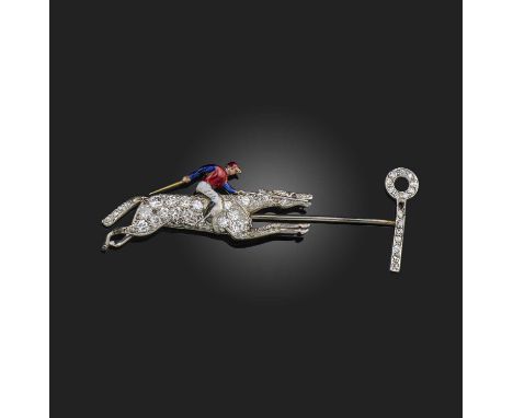 An early 20th century horse and jockey jabot pin, designed as a horse and jockey racing towards the finishing post, the jocke