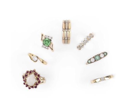 A group of seven gold and gem-set rings, comprising: an opal and ruby cluster ring, size I; a five stone emerald and opal rin