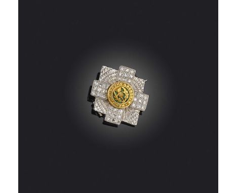 A Regimental brooch for the Scots Guards, set with single-cut diamonds and green enamel on yellow and white gold, maker B&amp
