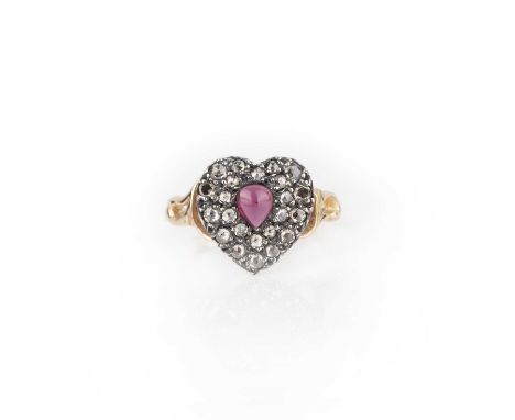 A garnet and diamond ring, centring on a heart-shaped motif set with a cabochon garnet and rose-cut diamonds, to a gold band 