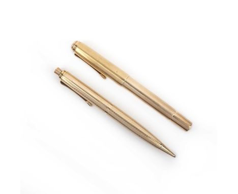 Pelikan, a 14ct gold mechanical pencil, with engine-turned decoration, length 13cm, with a 14ct gold fountain pen by Pelikan,