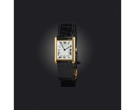 Cartier, a gold 'Tank Louis Cartier' wristwatch, 1980s, rectangular white enamel dial with black Roman numeral indicators, an