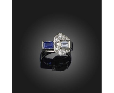 An Art Deco sapphire and diamond ring, 1930s, designed as a stylised buckle, set with circular-cut diamonds, a step-cut diamo