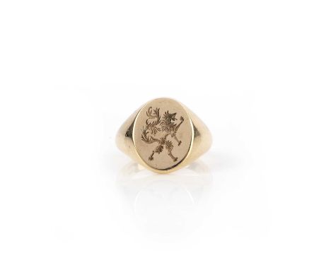 A gold signet ring, the oval front engraved with a lion rampant, in 18ct gold, size S1/2, British hallmarks, gross weight 22 