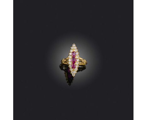 A ruby and diamond navette-shaped ring, set with graduated rubies within a diamond border in yellow gold, size L