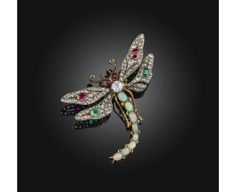 A Victorian gem-set and diamond brooch, late 19th century, designed as a dragonfly, set with cabochon and oval rubies, step-c
