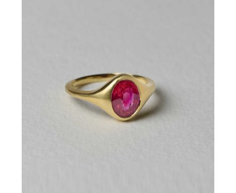 A ruby single-stone ring, rubover-set with an oval ruby weighing 2.09 carats, to a tapering gold band, size MAccompanied by A