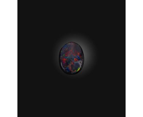 †A loose solid black opal weighing 2.21cts