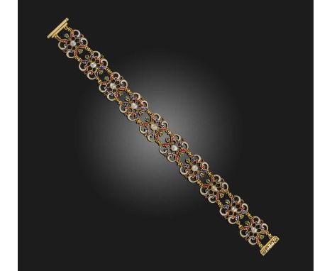 A Renaissance Revival enamel and pearl bracelet, mid 19th century, composed of scrolled links applied with red, blue, green a