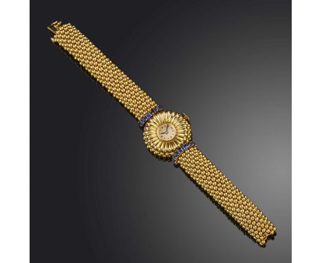 Péry & Fils, a Retro gold and sapphire watch, France, 1950s, the circular brushed gold dial with black enamel indicators and 