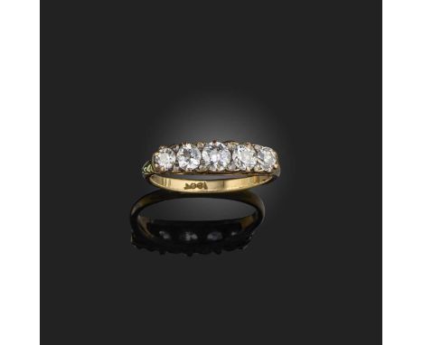 A diamond five stone ring, set with graduated old cushion-shaped diamonds in carved and pierced yellow gold setting, size O