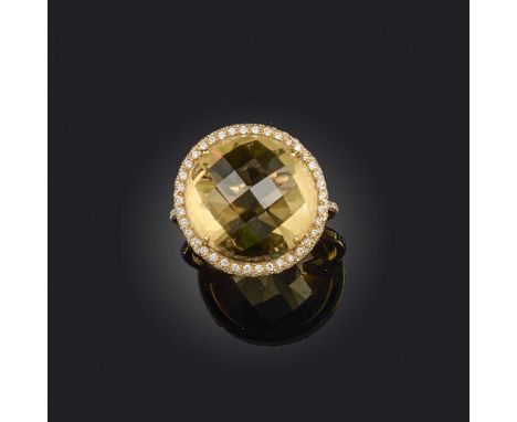 A citrine and diamond ring, set with a rose-cut citrine, within a border of brilliant-cut diamonds, mounted in gold, size M