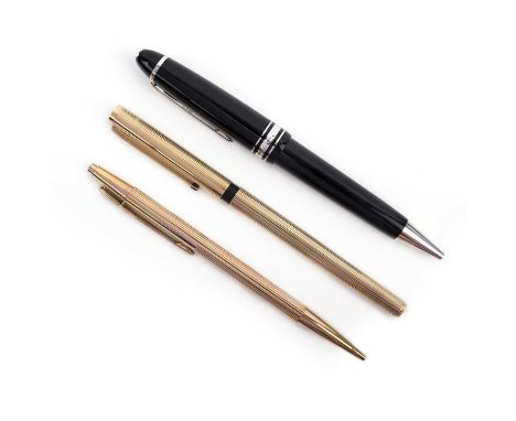 Montblanc, two pens and a propelling pencil, comprising: a stainless steel and black enamel ball point pen, length 14.8cm, si