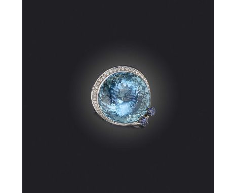 Pandora, an aquamarine and diamond dress ring, the large circular-cut aquamarine weighing approximately 60.00cts within a cre