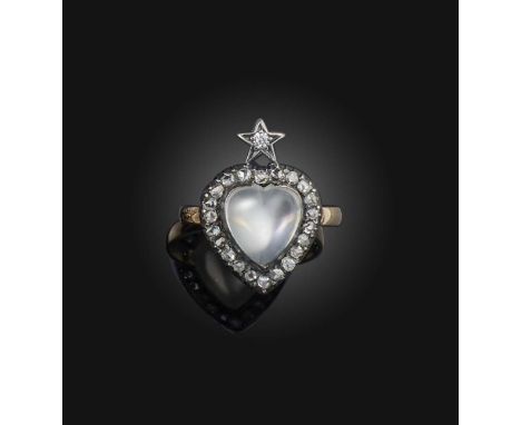 A moonstone and diamond ring, designed as a heart surmounted by a star, set with a polished heart-shaped cabochon moonstone, 