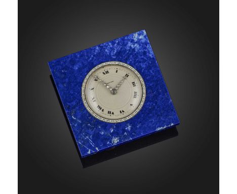 Cartier, an Art Deco lapis lazuli, enamel and diamond desk timepiece, 1920s, the silvered guilloché enamel dial with black en