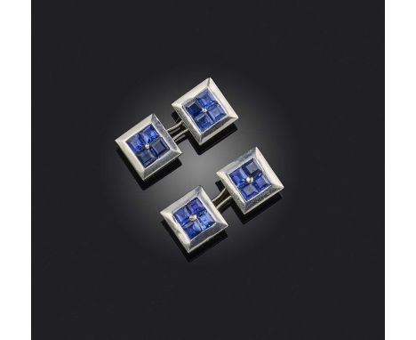 A pair of sapphire cufflinks, of square form, each set with calibré-cut sapphires within a polished platinum surround connect