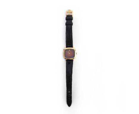 No reserve - Rolex, a lady's gold watch, 'Cellini', the rectangular watch with a deep orange dial, within a gold bezel, to a 