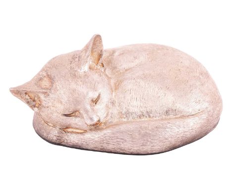 Asprey &amp; Co - a snoozing cat figurine in silver, London 1996, with textured fur decoration, and leather protector at the 