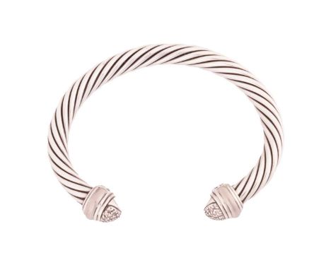 A diamond-set torque bangle by David Yurman, composed of twisted cables, terminating with domes pavé-set with diamonds, white