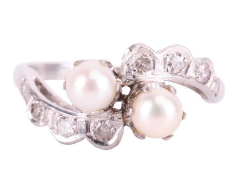 A cultured pearl and diamond crossover ring, featuring two cultured pearls measuring approximately 4.6mm each, centrally set 