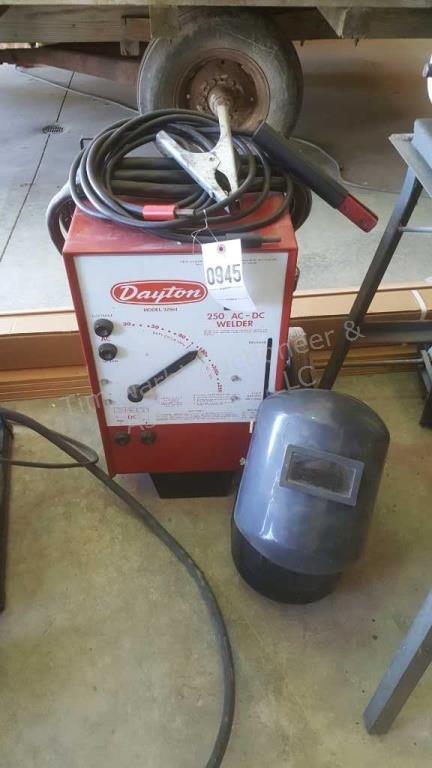 Dayton 250 ac/dc welder - model 3z564. Includes 2 small window helmets