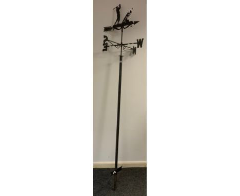 A metal-work Weather-vane, the figure/ornament depicting a Golfer teeing off, 242cm tall. 