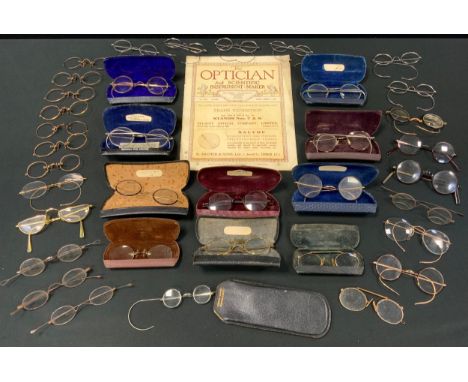 Glasses &amp; Spectacles -a pair of gold coloured metal framed spectacles, stamped S R Coll, wire arms; others tortoiseshell 