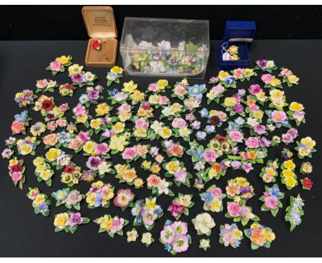 An English porcelain ceramic flowers;  similar earrings;  etc 