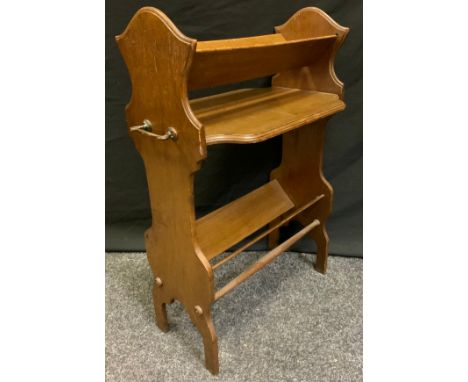 An early 20th century floor standing book trough, 72cm high, 50cm wide, c.1920 
